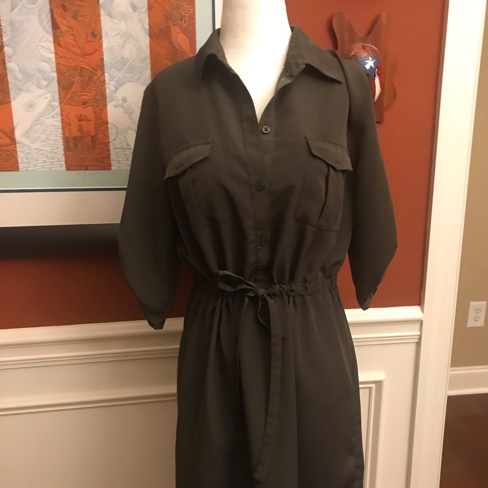 A very light olive green dress.
